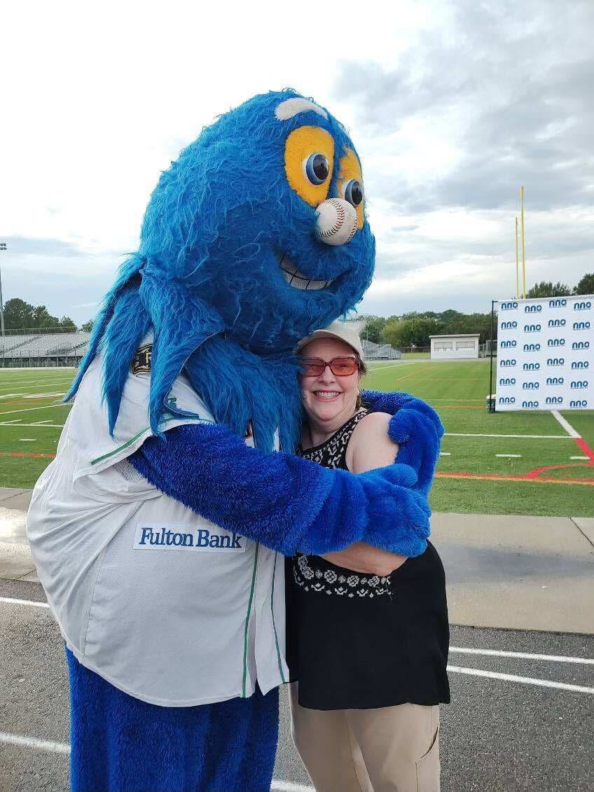Riptide shares a National Night Out moment with a community guest